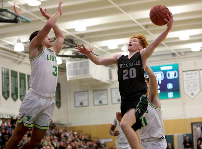 Leo Ricketts swoops in with his off-hand for two of his 17 points last season at the MLK Classic.